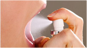 agefoto_rm_photo_of_woman_using_breath_spray